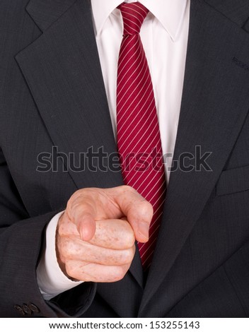 Bully boss businessman pointing finger aggressively
