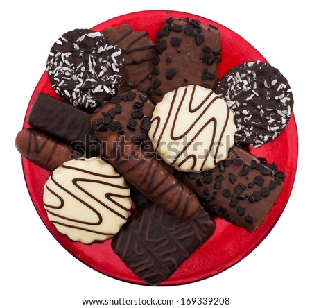 Chocolate biscuits on plate, isolated - high sugar, calories