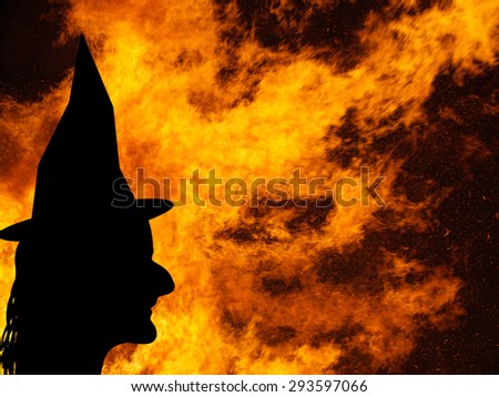 Halloween background. Real bonfire. Not real witch.