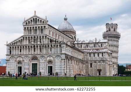 PISA,  ITALY - OCTOBER 2010. Two of Italy\'s most iconic tourist attractions - the Leaning Tower of Pisa and the Duomo (Cathedral).