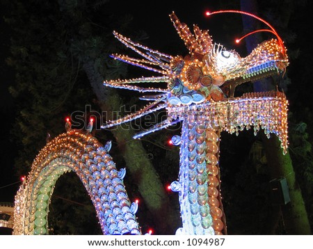 Chinese decoration on New Year, dragon made by plates and cups