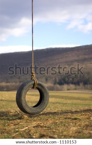 Tire Swing Hanging From the Sky
