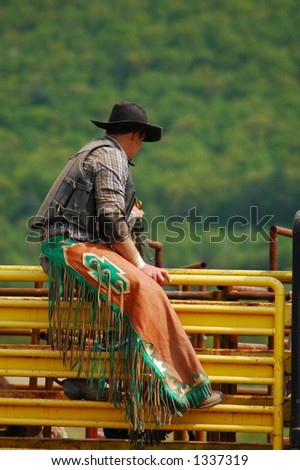 Bull Rider sitting on bucking chute