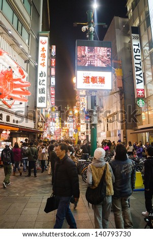 OSAKA - JANUARY 13: Dotonbori on January 13, 2013 in Osaka, Japan. With a history reaching back to 1612, the districts now one of Osaka\'s primary tourist destinations featuring several restaurants.
