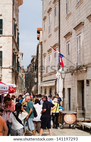 DUBROVNIK, CROATIA - MAY 13: Unidentified people walk along one of many streets on MAY 13,2013 in Dubrovnik. Croatia. Dubrovnik is one of the World Heritage Sites and very popular amongst tourists.
