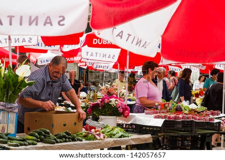 DUBROVNIK, CROATIA - MAY 12, 2013: Busy day at Dubrovnik\'s market. On 12 May 2013 in Dubrovnik, Croatia.