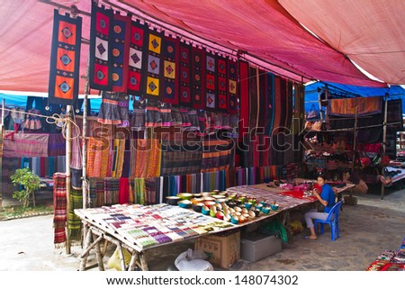 BAC HA, LAO CAI, VIETNAM - SEP 29: Unidentified women of the H\'mong Ethnic Minority People at sunday market on September 29, 2011 in Bac Ha, Vietnam. H\'mong are the 8th largest ethnic group in Vietnam