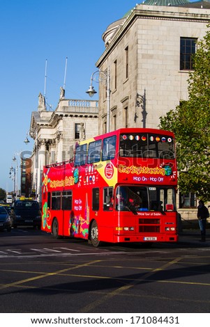 DUBLIN, IRELAND - NOV 11: a Dublin Sightseeing tour bus on Nov 11, 2013 in Dublin, Ireland. Dublin is a popular tourist destination with 6.5 million visitors from overseas in 2012 (source: ITIC).