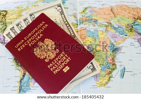 Red passports and money (polish zloty and dollars) over map background