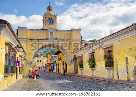 ANTIGUA, GUATEMALA - APRIL 22: View of colonial colorful buildings in Antigua, Guatemala on April 22, 2014. Antigua is the the former capital of Guatemala and was relocated in 1776 to Guatemala City.