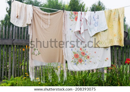Vintage laundry hanging out to dry outdoors in summer on a heritage park