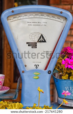 GOCZALKOWICE, POLAND - JULY 31: Vintage food scale in Goczalkowice, Poland on July 31, 2014. Mechanic food scales were commonly used in old days.
