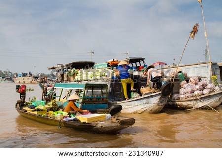 CAN THO, VIETNAM - SEP 14: Floating market on Mekong river delta near Can Tho, Vietnam on September 14, 2011. Cai Rang and Cai Be markets are very popular among the local citizens and tourists.