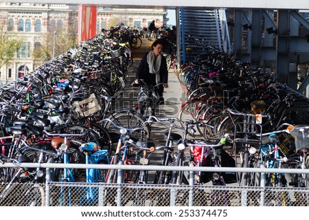 AMSTERDAM, THE NETHERLANDS - NOVEMBER 09: Few storey bicycle parking in Amsterdam, The netherlands on November 09, 2014.