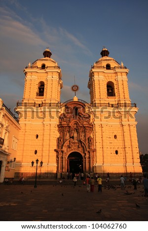 The main Cathedral in Lima, Peru, built in 1540, at dusk with golden light and shadows