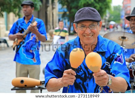 HAVANA, CUBA -  FEBRUARY 10:  On February 10, 2012, Cuban street musicians were playing traditional Cuban music for the entertainment of tourists in Old Havana.