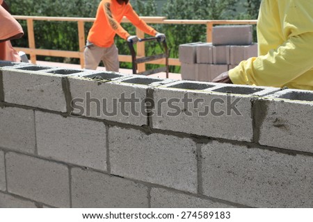 Building a cement block wall for a house