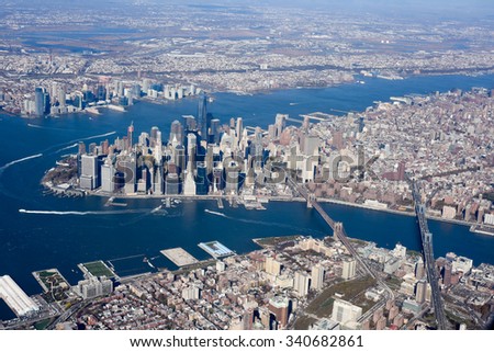 Aerial view of New York City with the Hudson River and the East River in Lower Manhattan.