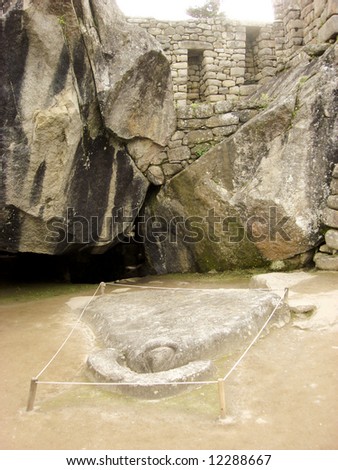 The Condor rock with wings in the surrounding walls at Machu Picchu, the Lost Inca City
