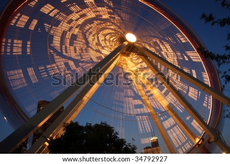  Navy Pier amusement park at night with lighted Ferris Wheel in motion