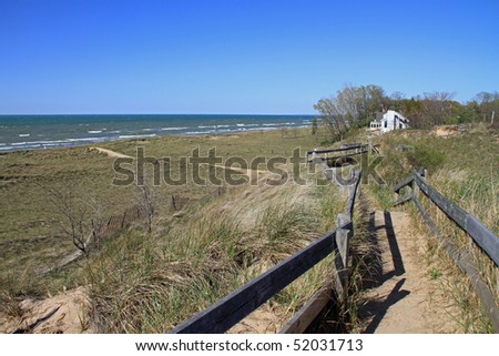 Attractive wooden boardwalk atop the sand dunes along Lake Michigan in New Buffalo, Michigan