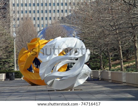 CHICAGO - APRIL 5: On April 6, 2011 Mexican sculptor Yvonne Domenge\'s Tabachin Ribbon and other spheres will open to the public in Chicago\'s Millennium Park. April 5, 2011 in Chicago
