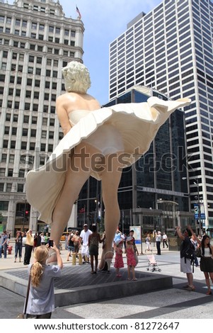 CHICAGO - JULY:  A giant 26 foot tall sculpture of Marilyn Monroe was unveiled in Chicago on July 18, 2011.  Created by artist Seward Johnson, the work stands in a square on Michigan Avenue.