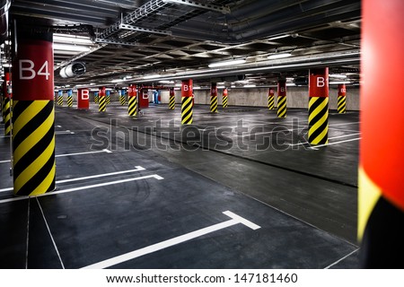 Parking Garage Underground Interior, Neon Lights In Dark Industrial Building, Modern Public Construction