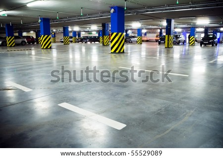 stock photo : Parking garage of shopping center, underground interior