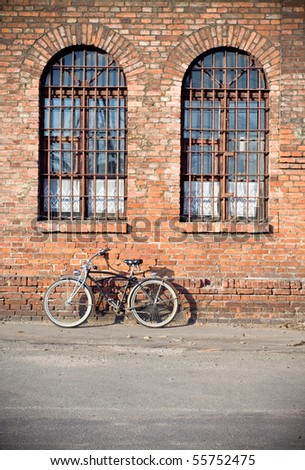 Cruiser bicycle lean on a retro brick wall