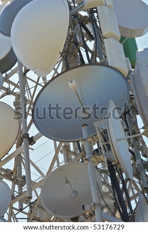 Mobile telephones tower,with different antennas and dishes