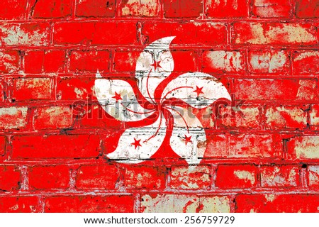 Hong Kong flag painted on old brick wall texture background