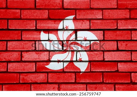 Hong Kong flag painted on old brick wall texture background