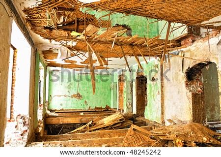 interiors of a neglected house in really bad condition filled with mold and devastation