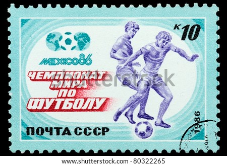 USSR - CIRCA 1986: A post stamp printed in USSR shows football players, series World Football Cup in Mexico, circa 1986