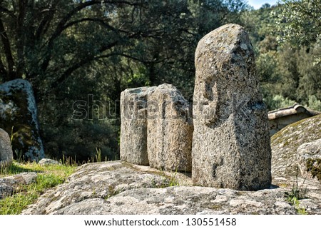 Filitosa, Corsica. Old stone figures of an ancient civilization. The place is now an open-air museum. The site once served religious purposes and possesses numerous figures carved of stone.