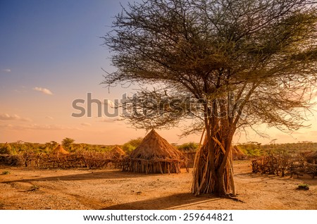 Africa, Ethiopia, huts in a Hamer village in the sunset light