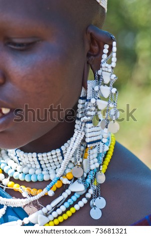 LAKE EMPAKAI, TANZANIA-AUGUST 15: Ear ring of an unidentified Masai Woman at Lake Empakai, Tanzania, on August 15, 2010. Masai women wear many handmade jewels