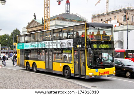 BERLIN - SEPTEMBER 10, 2013: MAN A39 Lion\'s City DD double-decker bus of Berliner Verkehrsbetriebe bus company at Friedrichstrasse street.