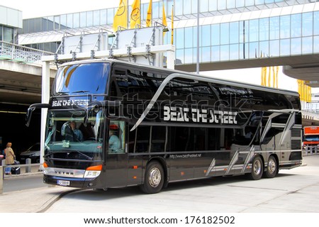 FRANKFURT AM MAIN, GERMANY - SEPTEMBER 13, 2013: Black Setra S431DT luxury interurban coach at the bus station at Flughafen International Airport.