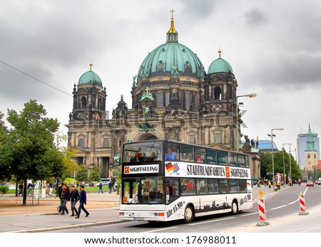BERLIN, GERMANY - SEPTEMBER 12, 2013: MAN A14 ND202 city sightseeing bus at the city street.