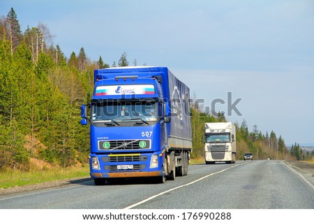 Sverdlovsk Region, Russia - May 8, 2012: Blue Volvo Fh12 Semi-Trailer Truck At The Interurban Road.