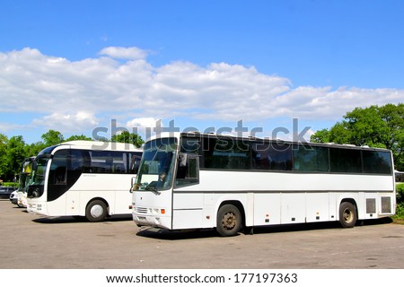 PETERGOF, RUSSIA - MAY 27, 2013: White Smit Orion and MAN R08 Lion\'s Top Coach interurban coaches at the bus station.