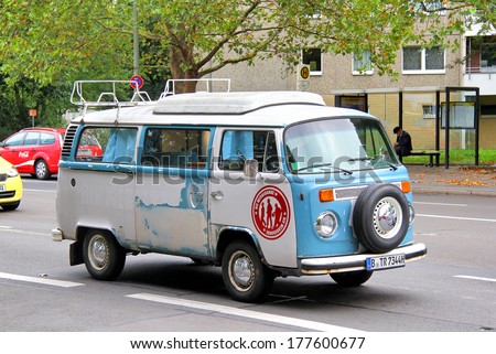 BERLIN, GERMANY - SEPTEMBER 11, 2013: Blue Volkswagen Transporter retro van at the city street.