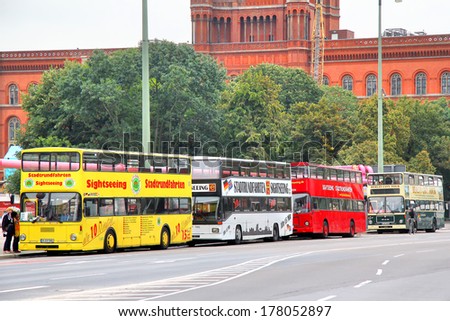 BERLIN, GERMANY - SEPTEMBER 12, 2013: City sightseeing buses at the city street.