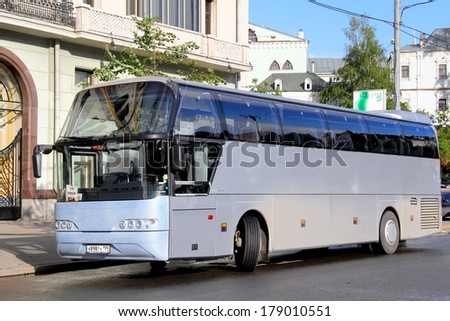 MOSCOW, RUSSIA - JUNE 3, 2012: Grey Neoplan N1116 Cityliner interurban coach at the city street.
