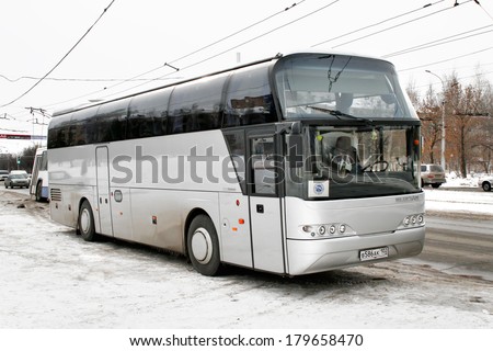 UFA, RUSSIA - MARCH 10, 2008: Silver Neoplan N1116 Cityliner interurban coach at the city street.