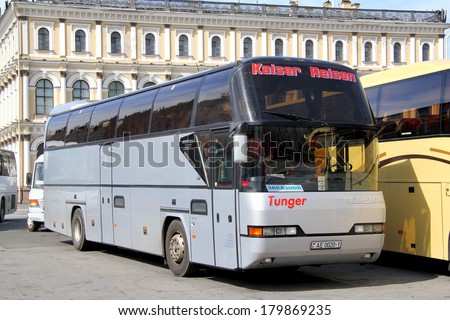 SAINT PETERSBURG, RUSSIA - MAY 25, 2013: Grey Neoplan N116H Cityliner interurban coach at the city street.