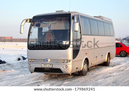NOVYY URENGOY, RUSSIA - NOVEMBER 11, 2013: Silver Temsa Opalin interurban coach at the city street.