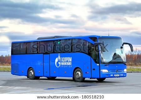 NOVYY URENGOY, RUSSIA - SEPTEMBER 25, 2012: Blue Mercedes-Benz O350RHD Tourismo interurban coach at the city street.